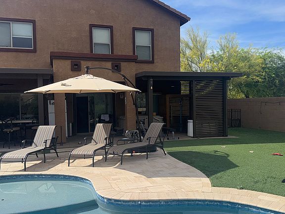 Backyard facing house