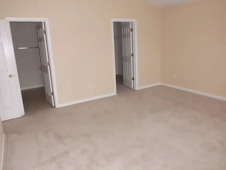 HUGE primary bedroom with double walk in closets.