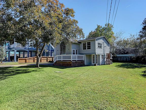 LARGE DOUBLE LOT ALLOWS PLENTY OF ROOM FOR A POOL, ADDITIONAL PATIO SPACE OR ANOTHER DRIVEWAY FOR RV OR BOAT STORAGE.