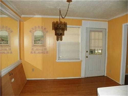 The dining room opens to the kitchen - great for entertaining.