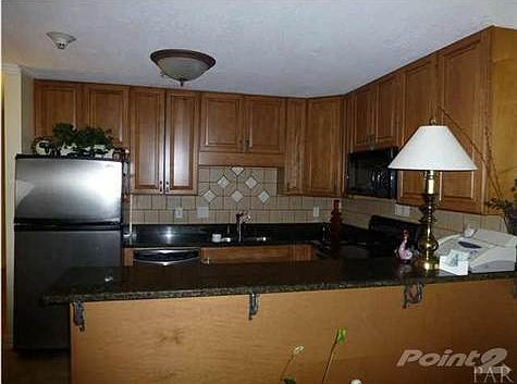 Kitchen with Granite counter tops and stainless steel appliances