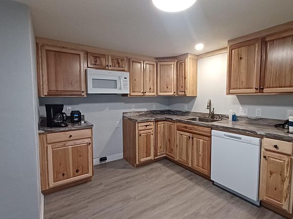 All new kitchen with dishwasher and microwave vent provided.