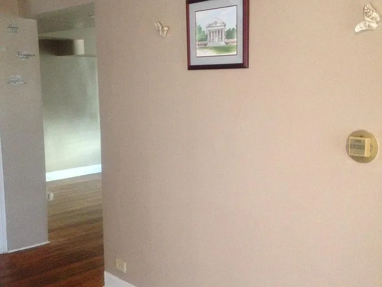 Foyer leading to dining room on right