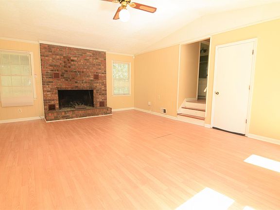 Living Room with Wood Burning Fireplace