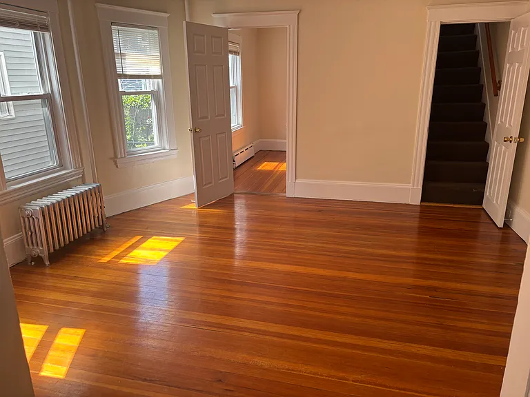 Dining room (view to 1st floor bedroom and stairs to 2nd bedroom)