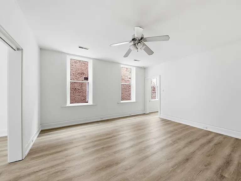 Dining room, looking toward hallway to entry and kitchen.