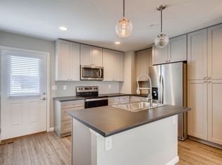 Irving Row - Modern 3-Bedroom Townhome with Open Living Space & Upstairs Laundry, Denver, CO 80221