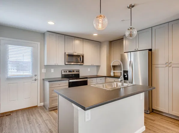 Irving Row - Modern 3-Bedroom Townhome with Open Living Space & Upstairs Laundry, 6501 Irving St #2, Denver, CO 80221