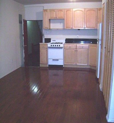 5th image of 336 E 54th St APT 11