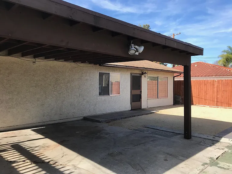 Carport and front of house. This is the back house of the 2 houses