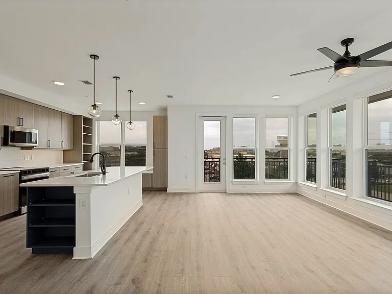 Spacious open-concept with floor-to-ceiling windows