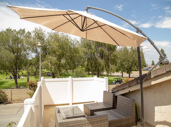 Balcony from master bedroom with golf course view.