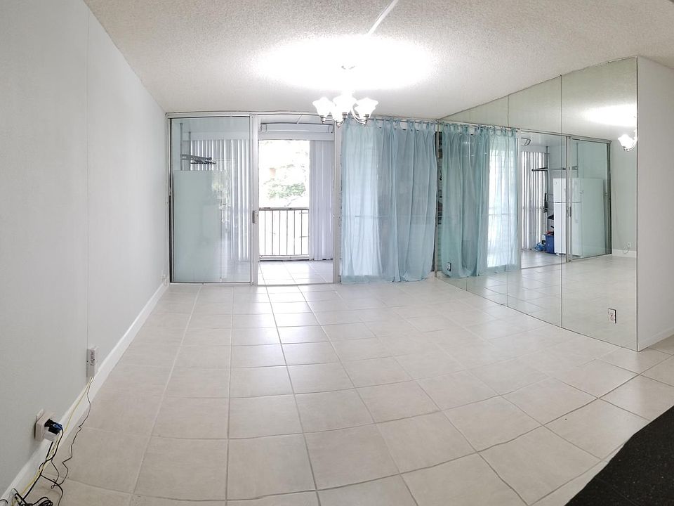 Living Room with screened patio in the background