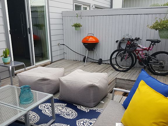 Rear Deck Patio with view of entrance to Kitchen.