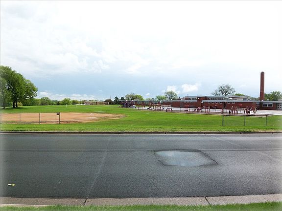 Across the street is park and elementary school