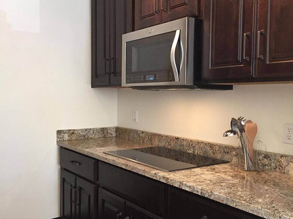 Kitchen w/ cooktop shown