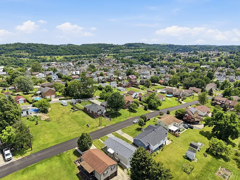 Drone shot - facing from the back of the property.