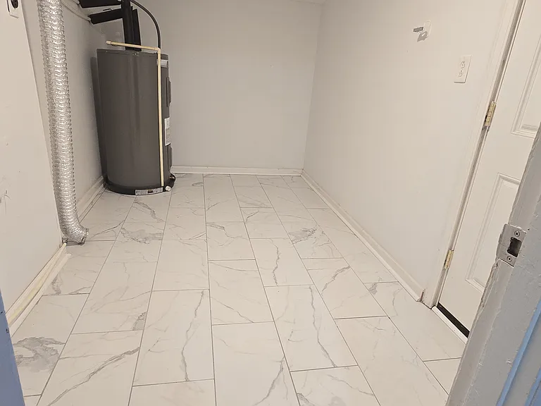 Laundry room with washer and dryer connections.