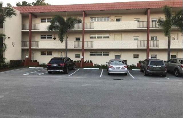 1st image of 9811 N Hollybrook Lake Dr APT 305