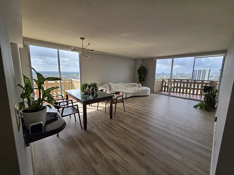 Living area with main and side balcony