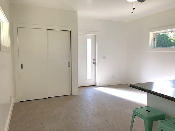 Living room, with closet.