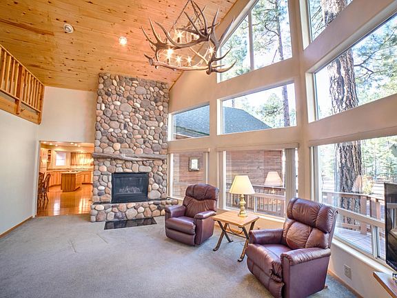 Floor to ceiling stone fireplace