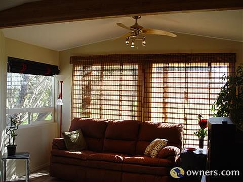 Another view of Living area Beams and Ceiling Fans