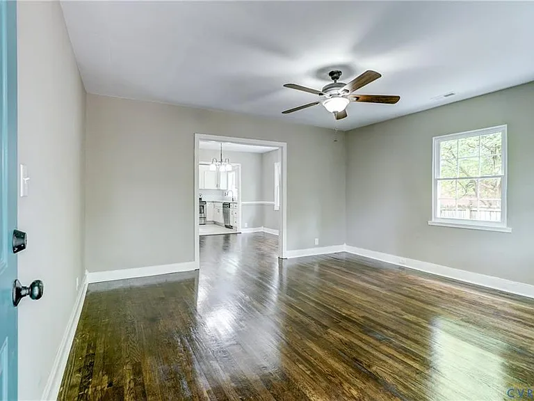 View from the front door! The living room, the dining room and the kitchen towards the back creates an open floor plan