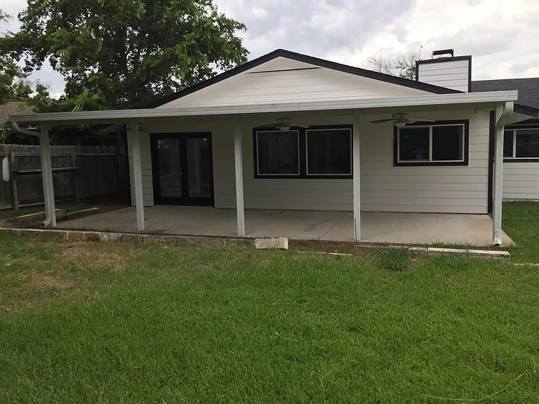 Big backyard and covered porch