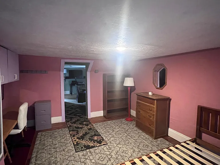 2nd floor furnished bedroom #2 with twin bed, dressers, etc