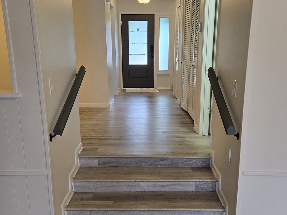 Looking back to front door from living room.