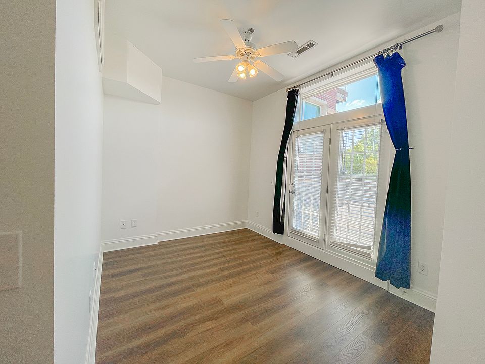 Downstairs bedroom with patio access