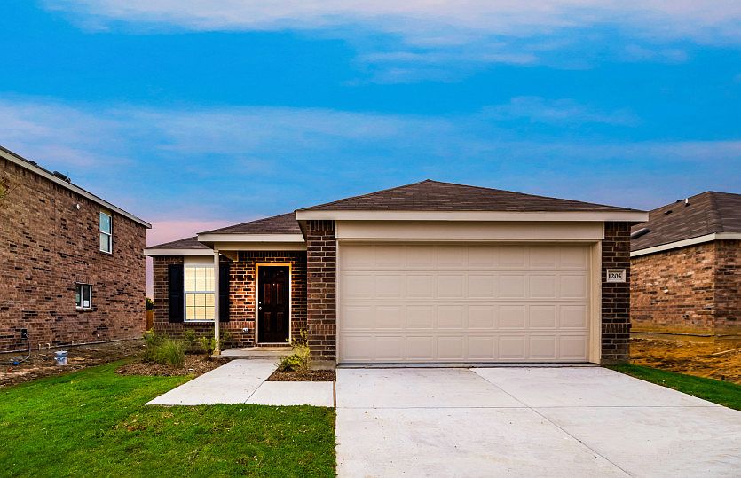 The Becket, a one-story home with 2-car garage, shown with Home Exterior N
