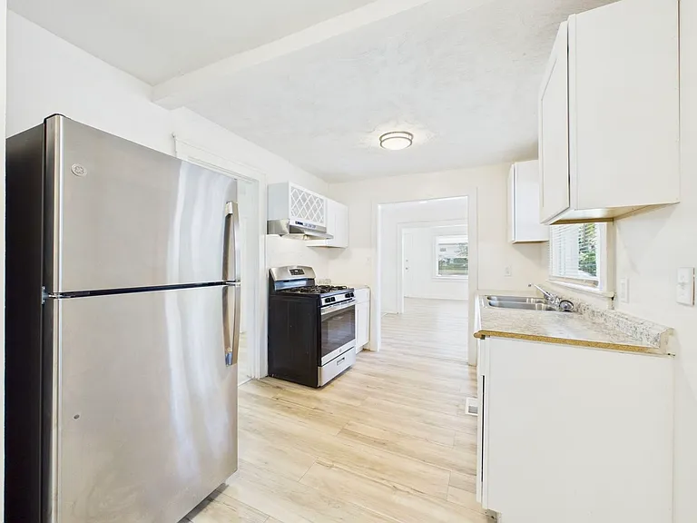 7127 Olive St — Photo 1