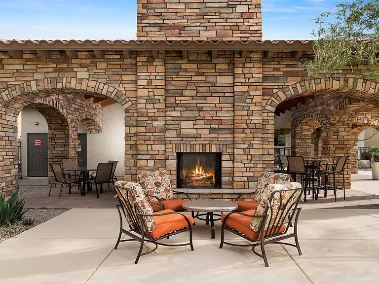 Outdoor fireplace and lounge area