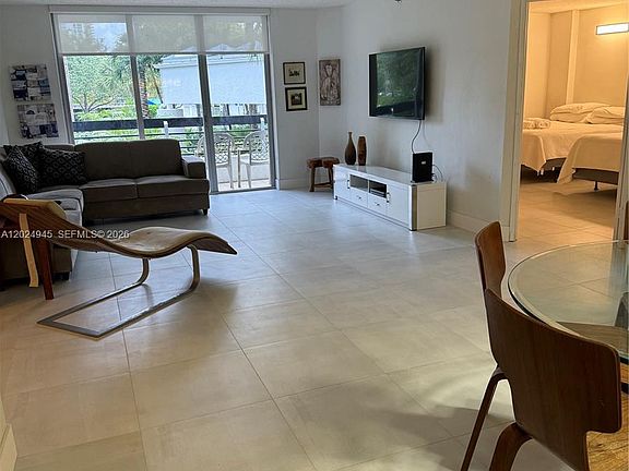 5th image of 3600 Mystic Pointe Dr APT 208