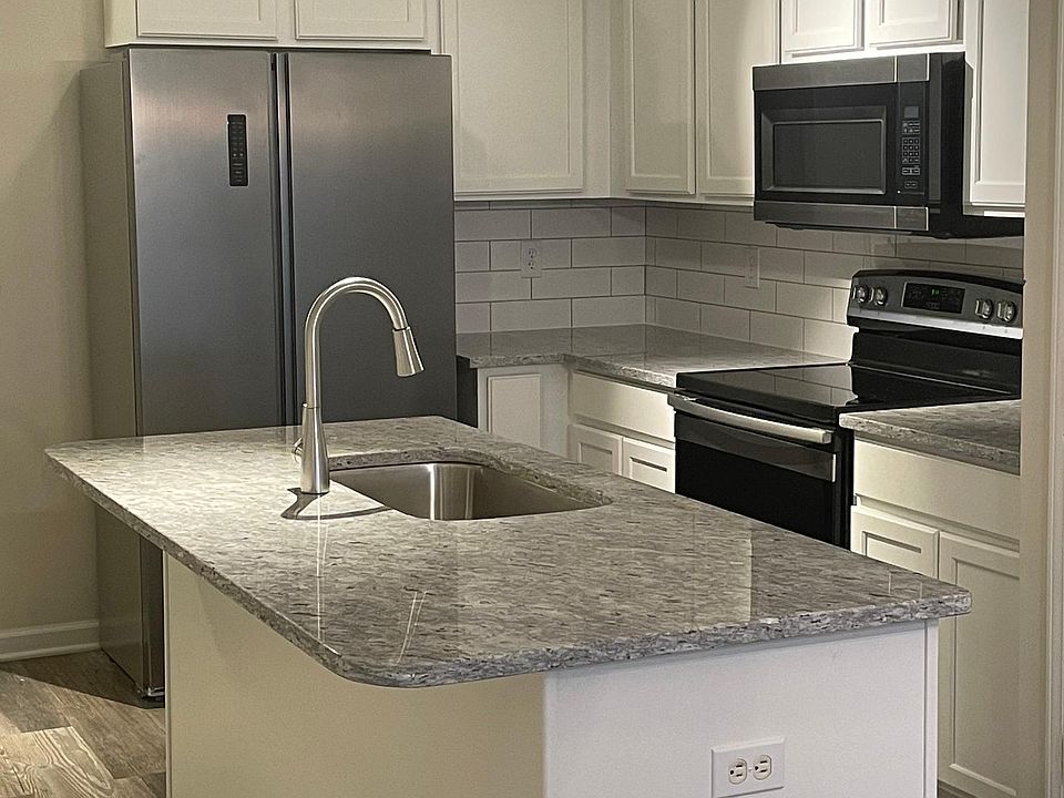 New granite and stainless appliances in kitchen
