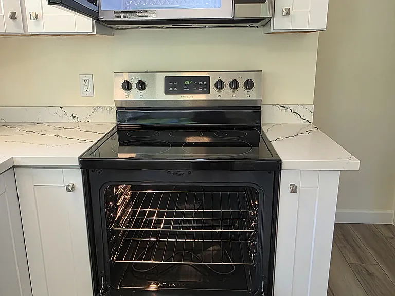 View inside the oven and microwave.