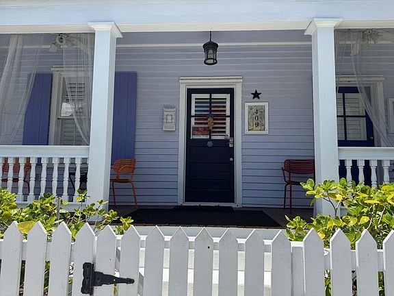 Yard is fenced and has a easy step up to the lovely front porch.