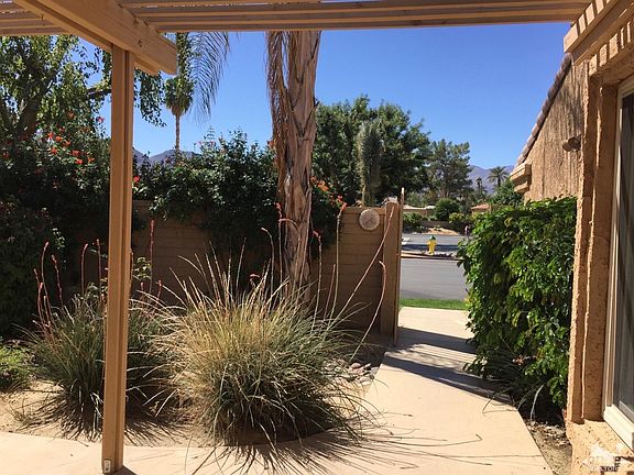 Enter through Wrought-Iron Gate to Large, Private Courtyard