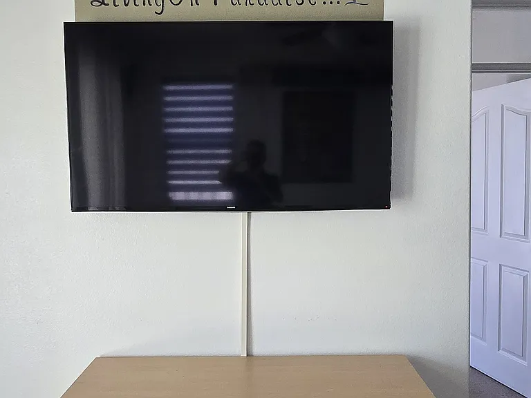 Smart TV in sitting area on 1st floor
