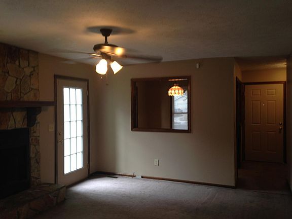 Greatroom facing back door, dinning room