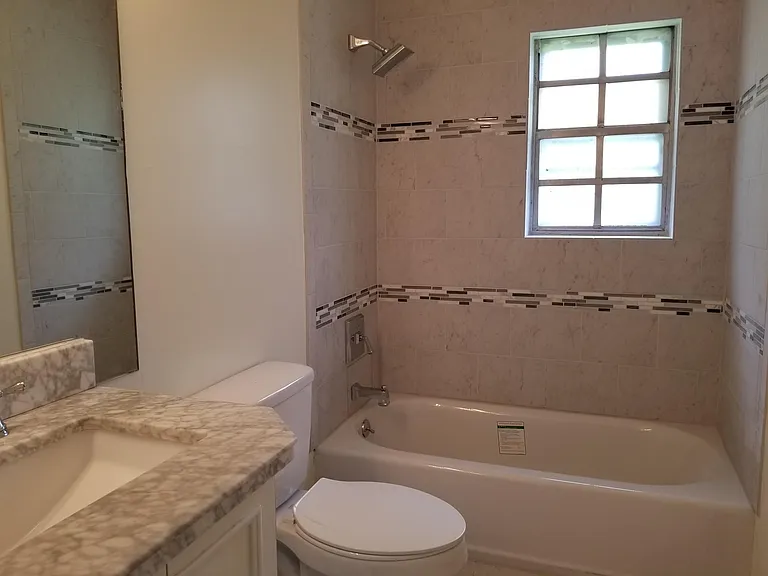 Newer Bathroom; New Tub, Toilet & CT. New Windows Throughout.