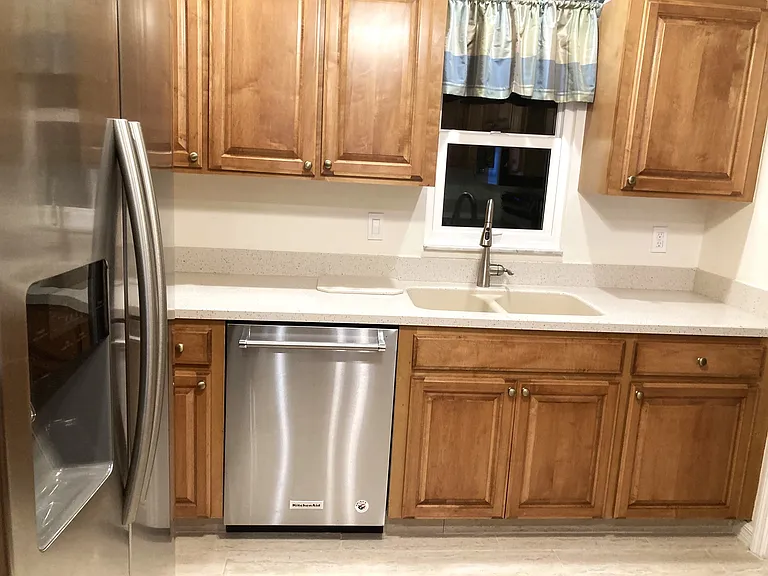 Kitchen with stainless dishwasher