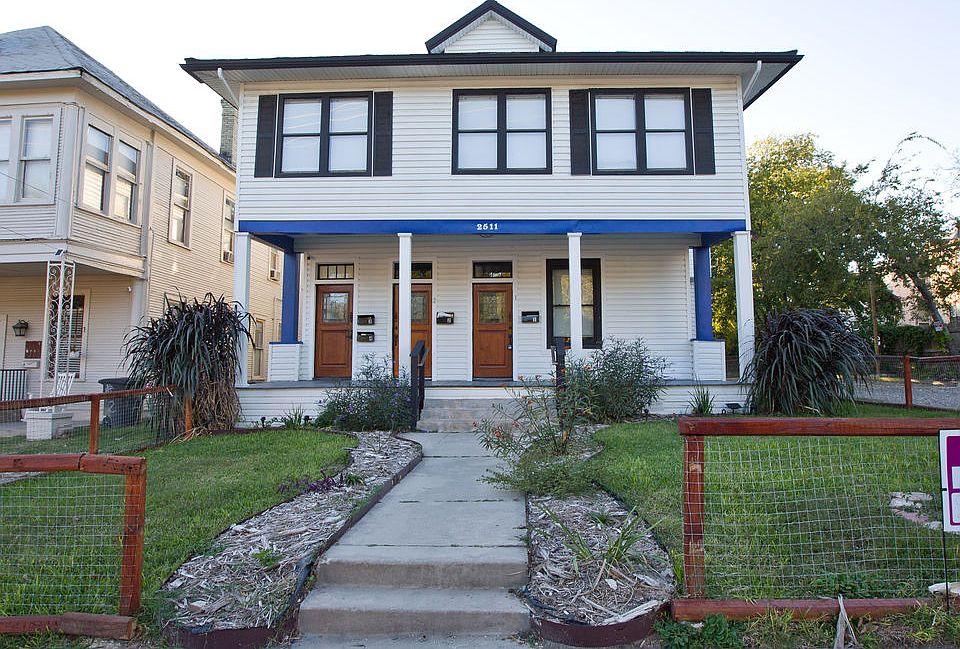 Photo of the facade of the fourplex.