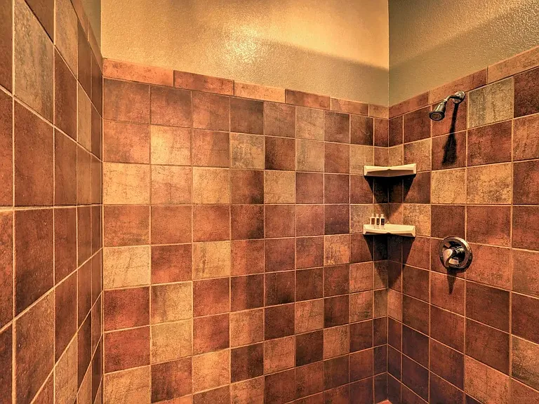 Large walk in Master Bathroom shower.