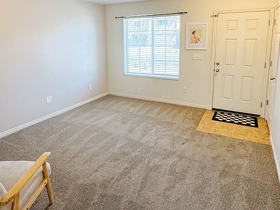 Front room | natural lighting and a coat closet