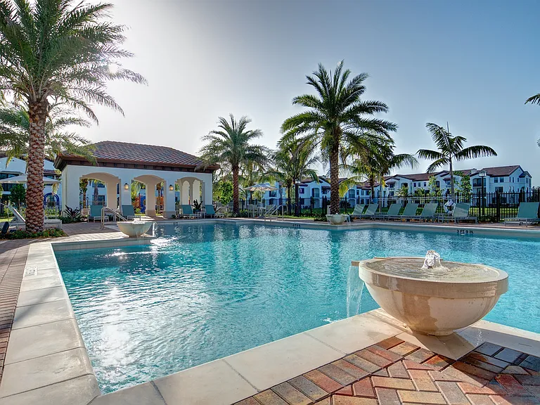 Venetian Style Pool with Cabanas and Fountain