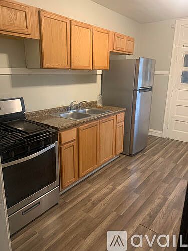 2nd image of 5822 W Arthington St #1F
