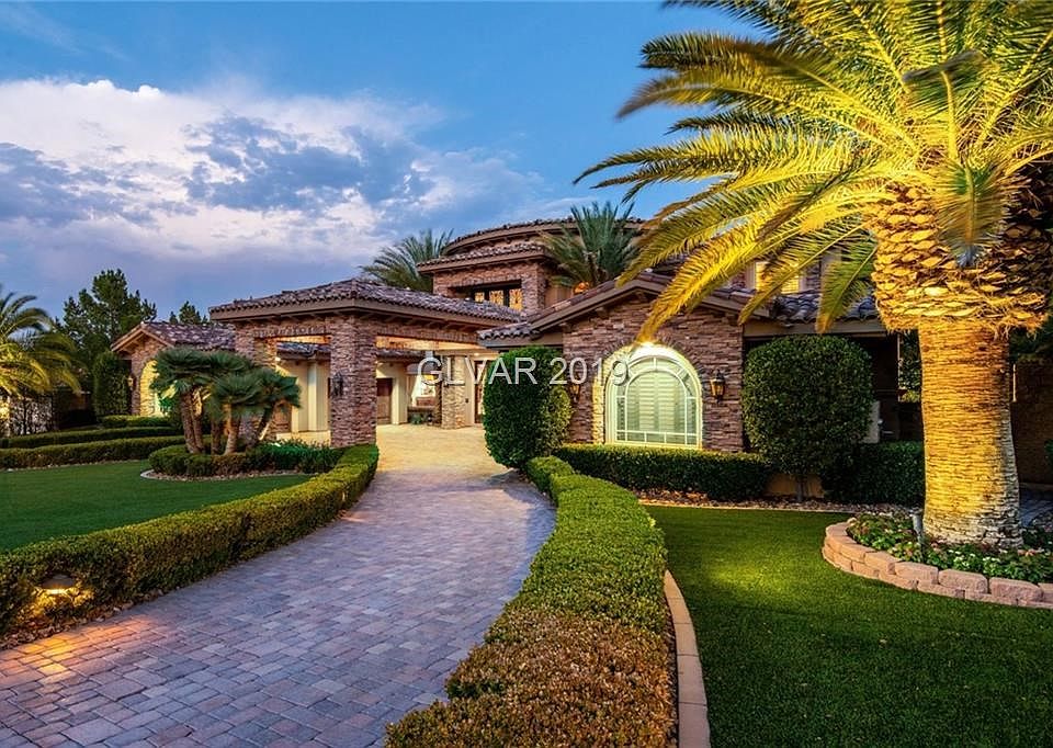 Magnificent custom home! Over 9000 sq ft, on 1/2 acre overlooking the greenbelt. No expense spared, custom designer touches throughout from the travertine floors, custom cabinetry, crown molding, venetian plaster, custom lighting and hardware, tray ceilings, rod iron dual staircase, 6 bedrooms, 6 1/2 baths, 6 car garage, magnificent outdoor living space with covered patio, stamped concrete, heated pool and spa, waterfall and built in BBQ!